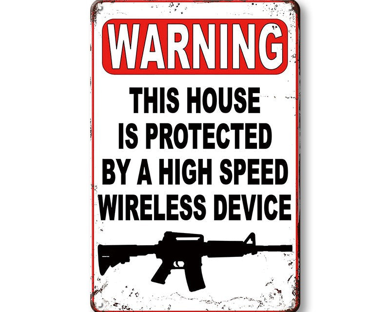 Metalen wandbord | This house is protected by a high speed wireless device |